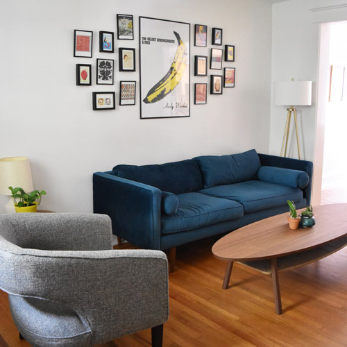 a midcentury modern living room designed by Brand*Eye Home